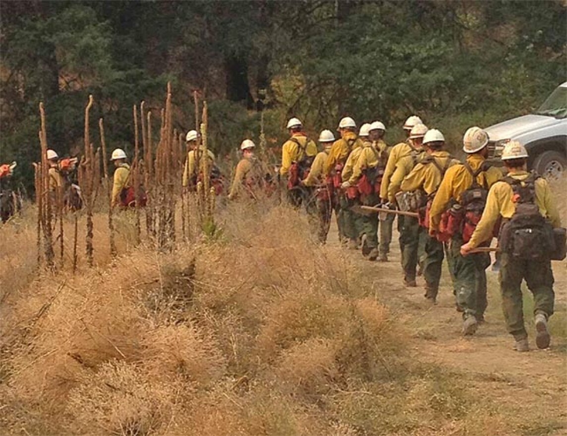 Crews are beginning to head home from the biggest wildfires in central Washington. Photo by by Michael Pennavaria via InciWeb